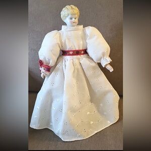 VINTAGE DOLL WITH PORCELAIN HEAD, WOODEN ARMS & LEG  10 INCHES TALL